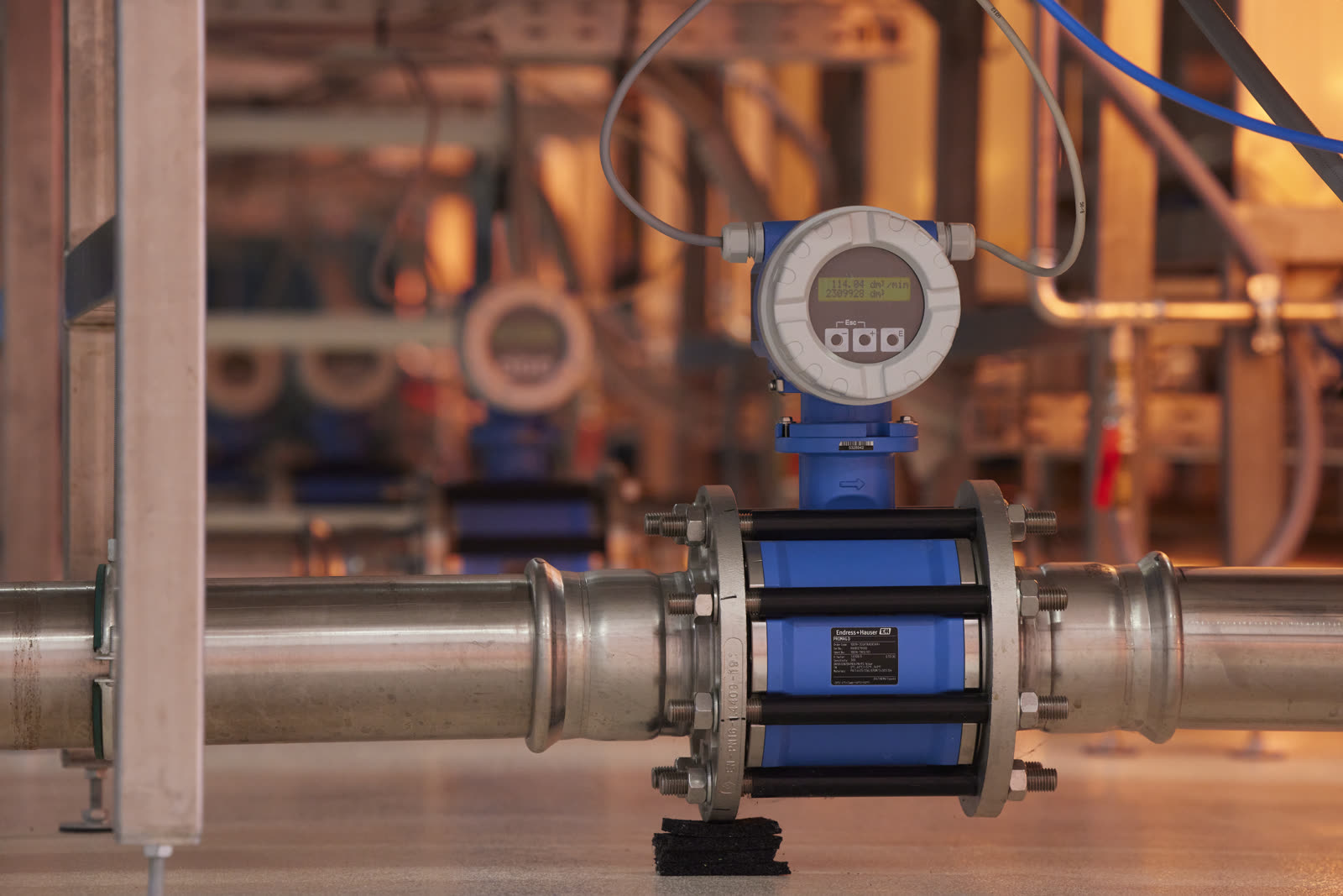 Inline flow meter on stainless steel water line